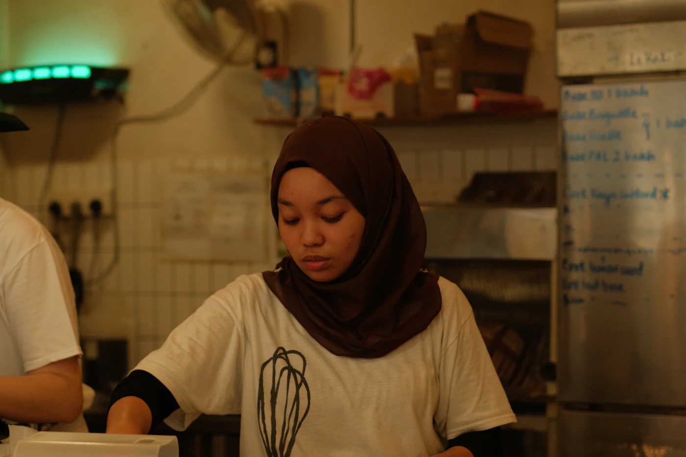 Café worker behind a counter